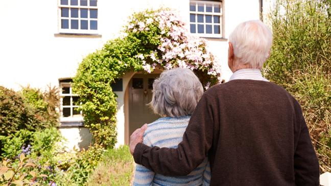 couple-outside-house-136401076871203901-151015122721.jpg